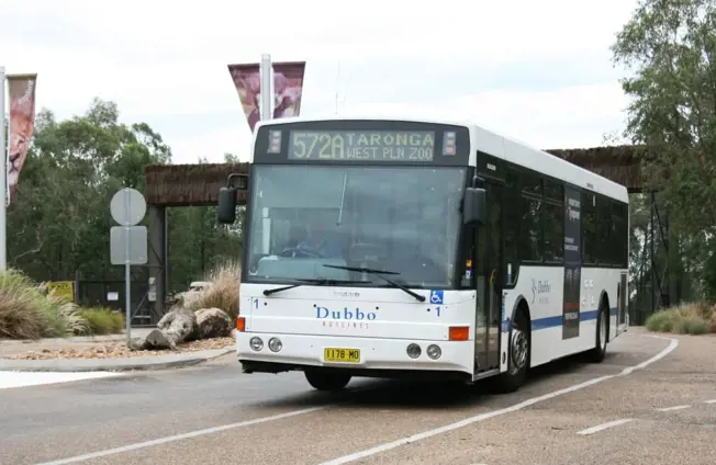 Bus driving on Zoo road at Taronga Western Plains Zoo