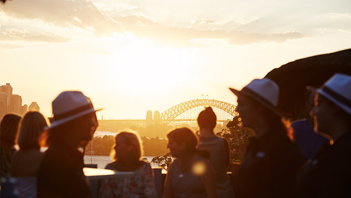 Patrons enjoying the sunset over Sydney Harbour from Taronga Zoo Sydney.