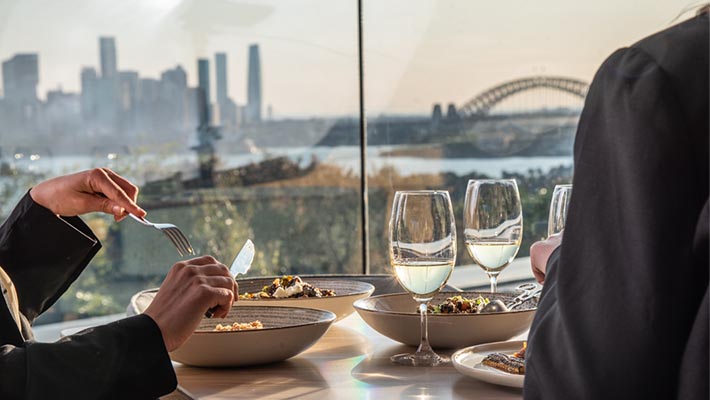 Drinks while watching the sun set over Sydney Harbour 