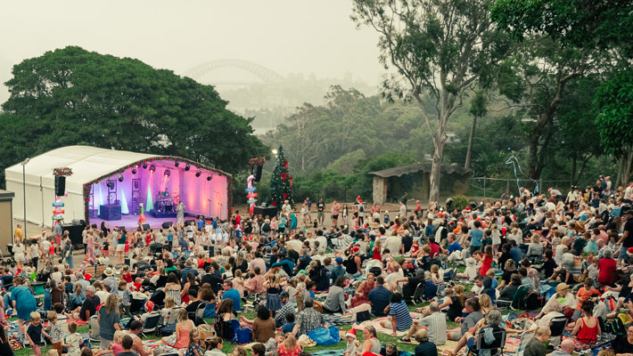 Concert stage and lawns with Sydney Harbour view in the background.