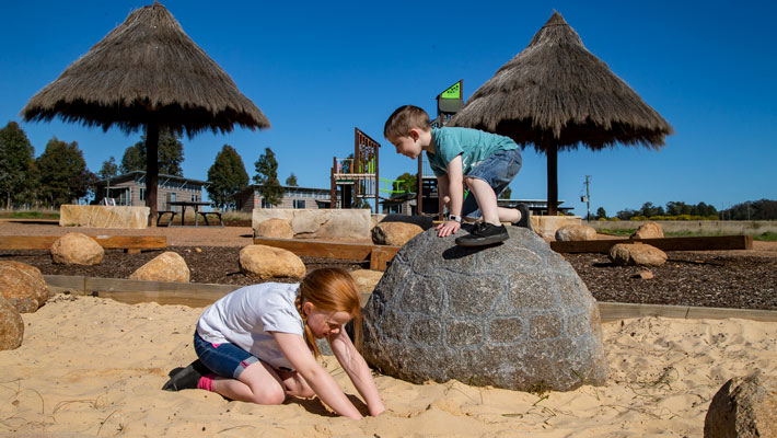 Let the kids run wild on the play equipment during your family getaway.
